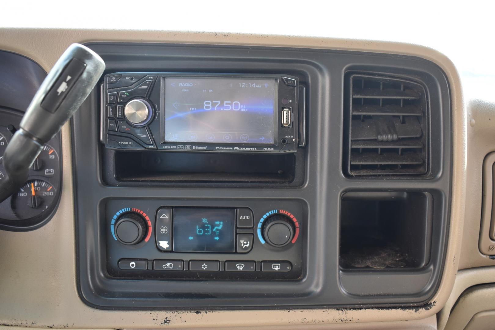 2003 Gold /Tan Chevrolet Suburban (1GNEC16Z23J) with an V8, 5.3.0L engine, 4 SPEED AUTOMATIC transmission, located at 5925 E. BELKNAP ST., HALTOM CITY, TX, 76117, (817) 834-4222, 32.803799, -97.259003 - Buying a 2003 Chevrolet Suburban can offer several benefits, including: Spaciousness: The Suburban is known for its ample interior space, making it great for large families, hauling cargo, or even converting into a camper. Towing Capacity: It's equipped with a robust engine and frame, allowing it - Photo#10